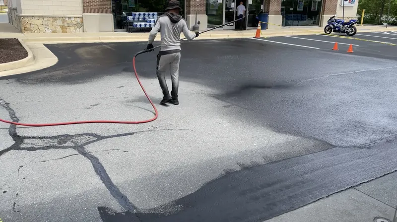 Asphalt sealcoating application commercial parking lot Virginia