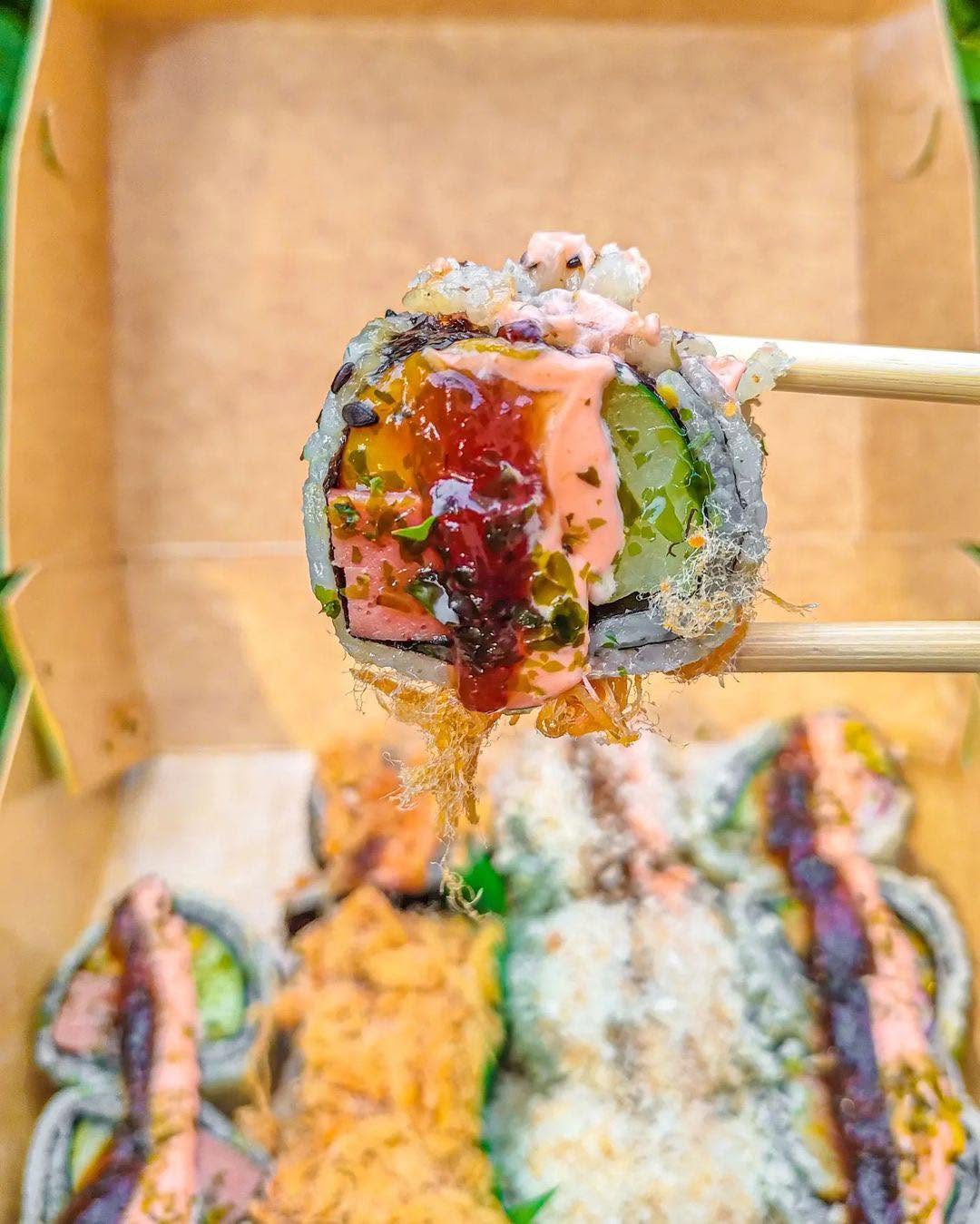 Tropical roll drizzled with sauce
