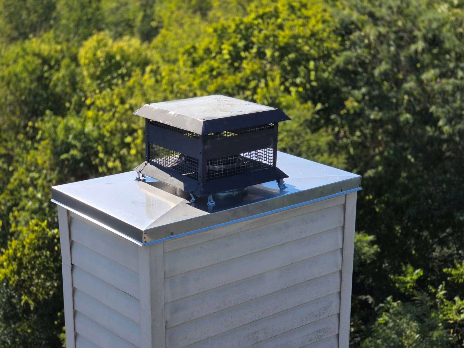 Before and after chimney crown repair and masonry work
