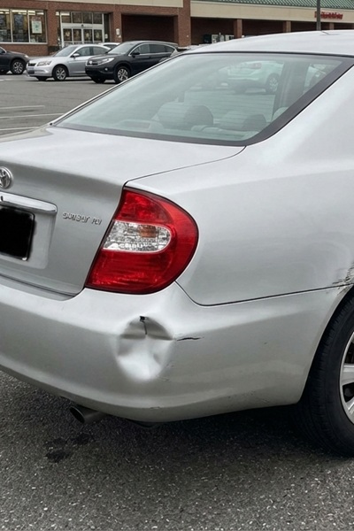 Minor accident repair Dallas TX professional technician repairing fender bender damage