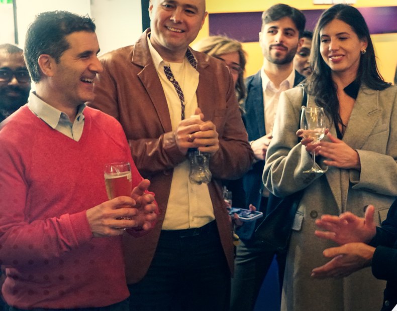 Investors talking at a VIC social mixer