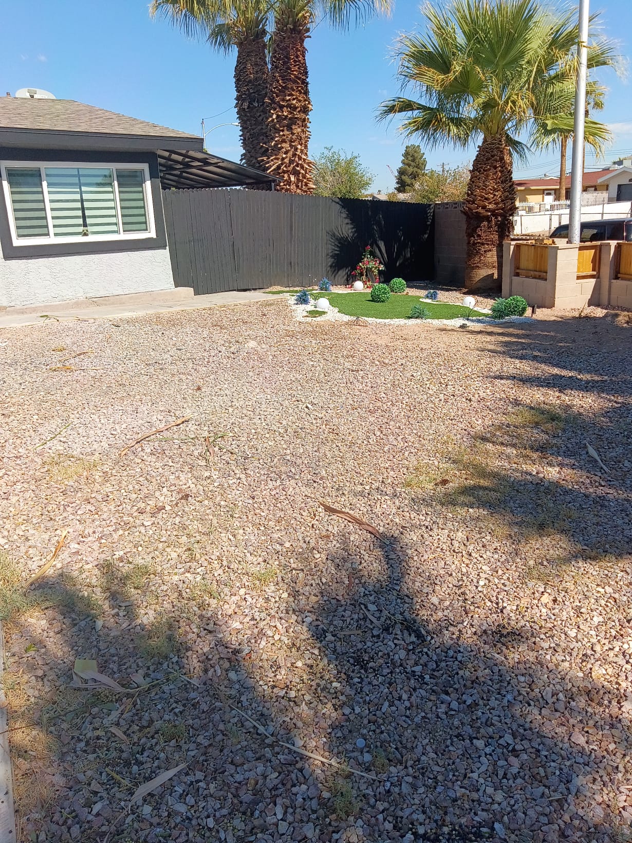 Front yard cleared and cleaned up by Legacy Removal Company