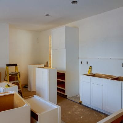 Partially assembled kitchen cabinetry in a remodeling project.