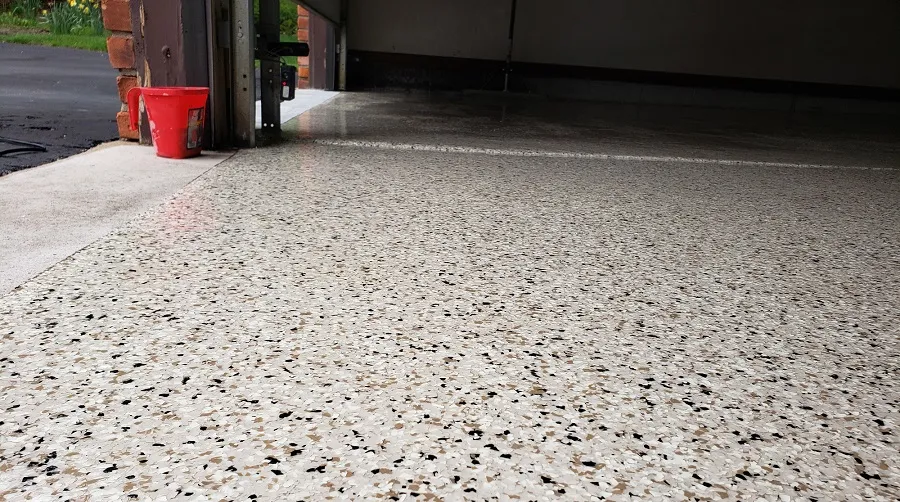 Concrete garage floor by SCP Stamped Concrete Pros Inc.