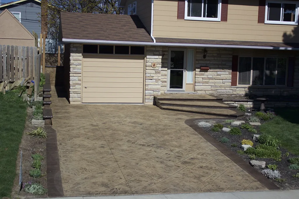 Concrete driveway installation by SCP Stamped Concrete Pros Inc.
