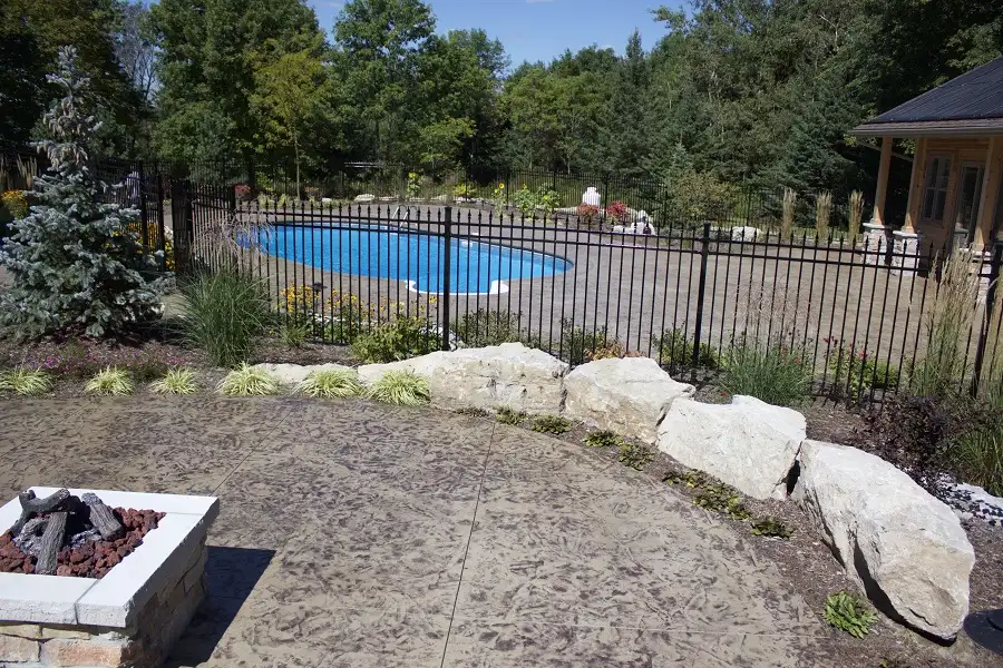 Outdoor living patio space installed by SCP Stamped Concrete Pros Inc.