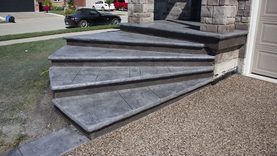 Concrete landing, steps, and residential walkway