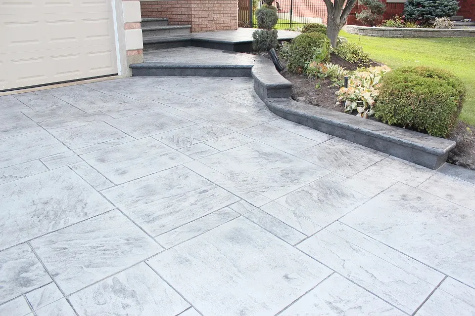 Stamped concrete driveway design installed by SCP Stamped Concrete Pros Inc. in Hamilton, Ontario