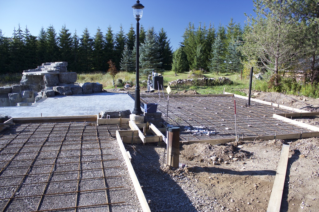 Concrete foundation construction by SCP Stamped Concrete Pros Inc.
