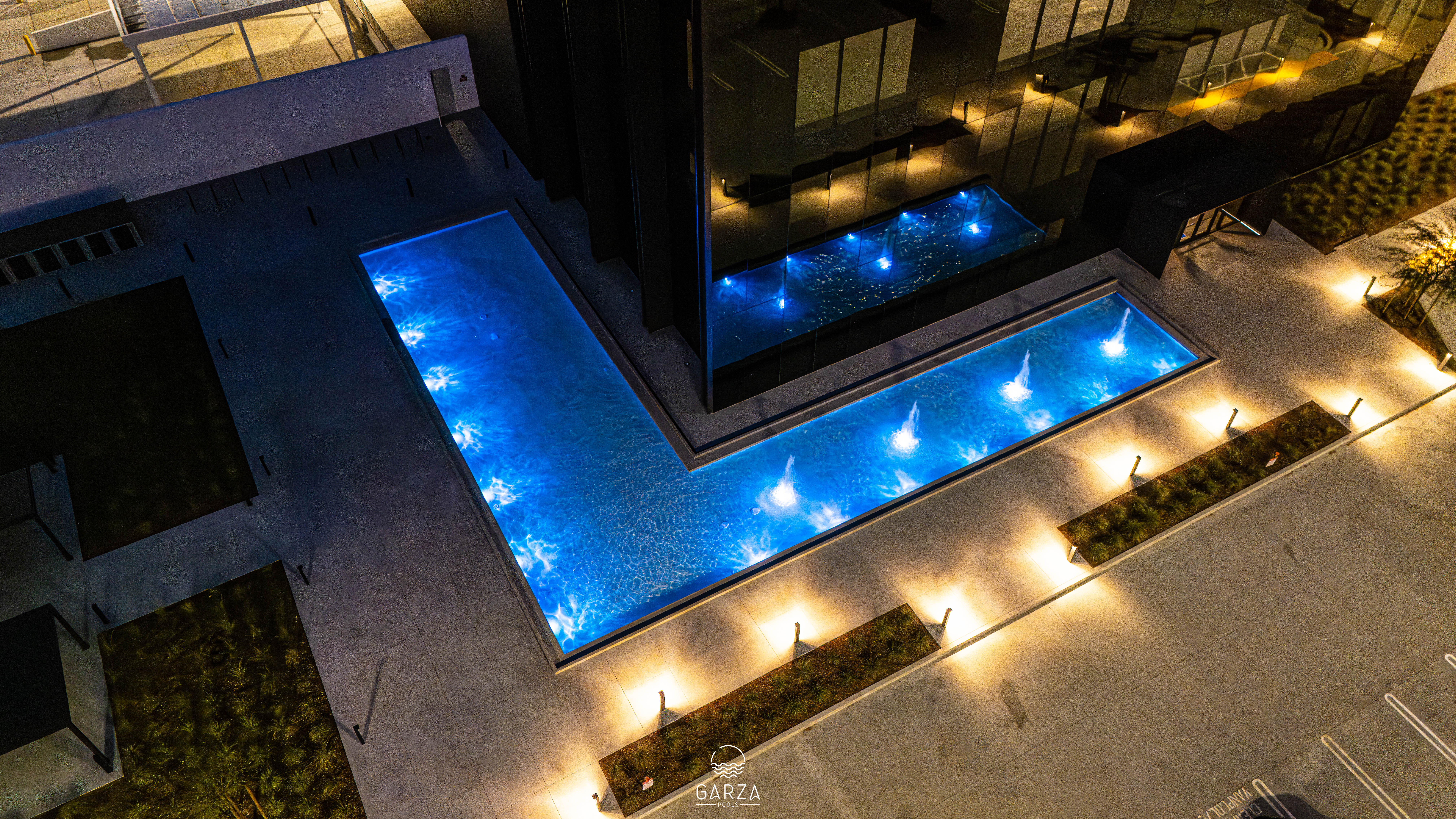 Custom pool and backyard built by Garza Pools in Del Mar, CA