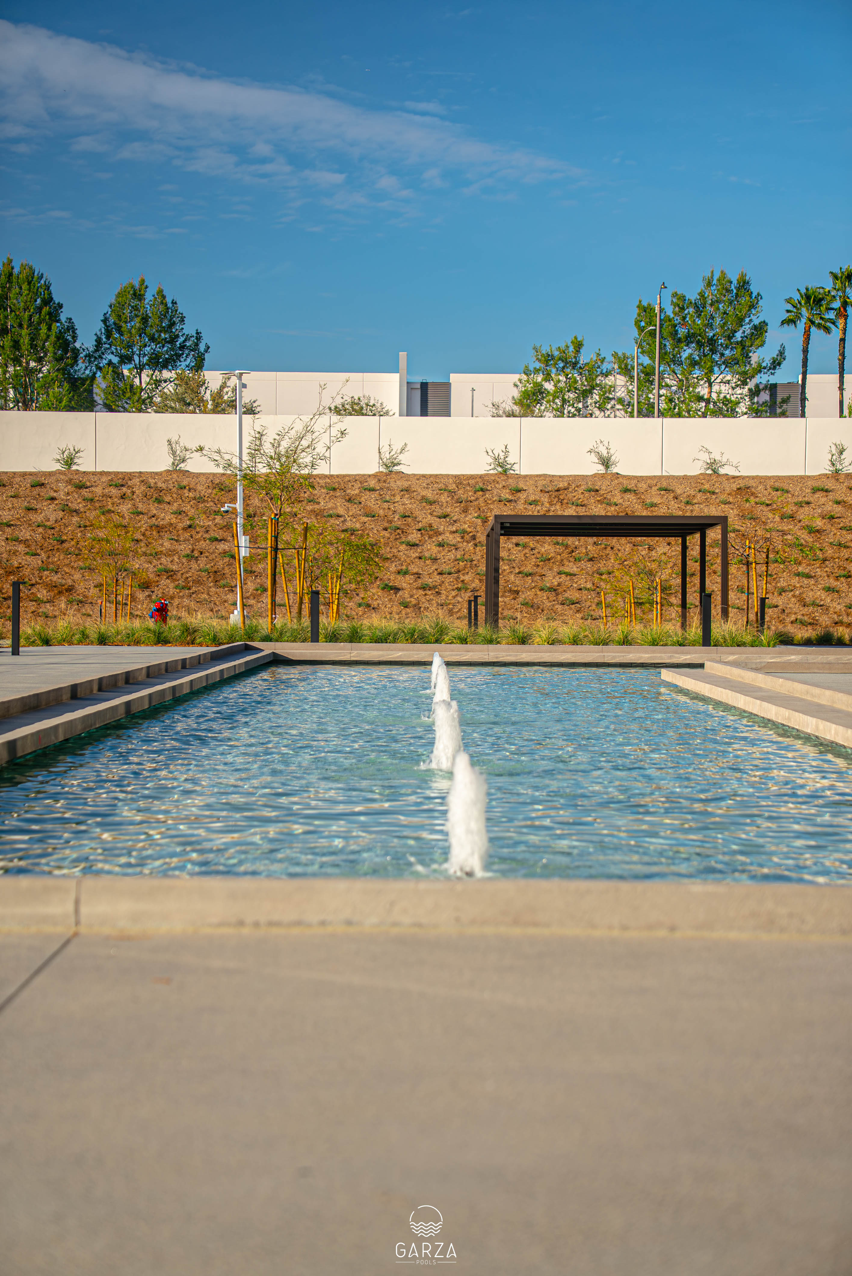 Custom pool and backyard built by Garza Pools in Carlsbad, CA