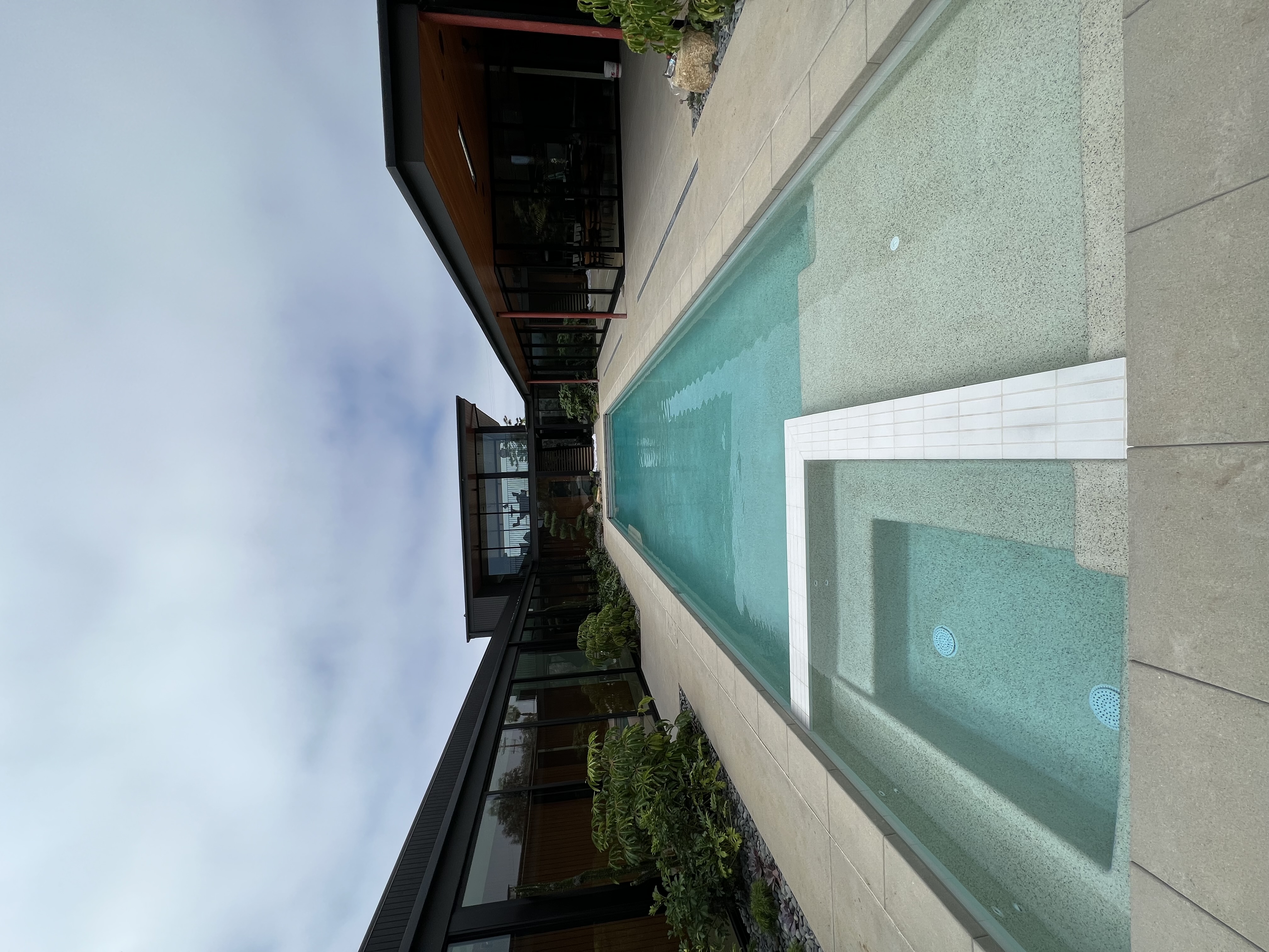 Custom pool and backyard built by Garza Pools in Point Loma, CA