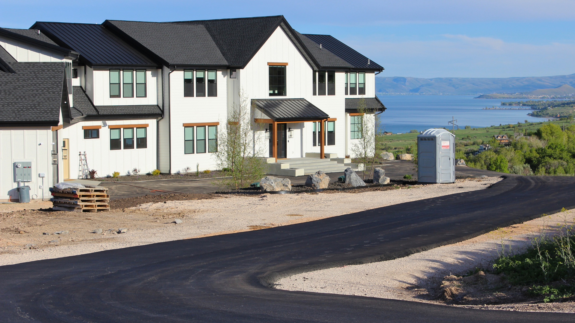Asphalt driveway leading up to a home in Bear Lake