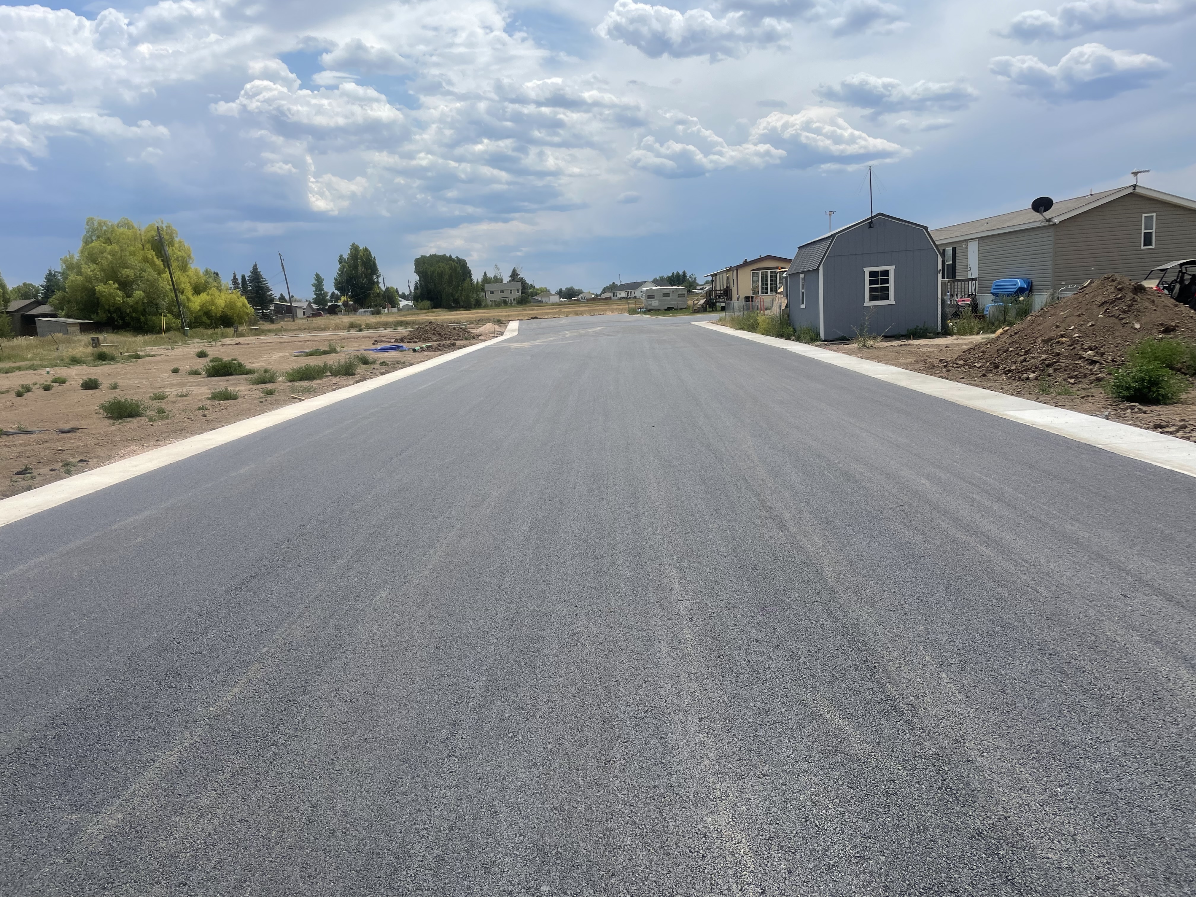 Asphalt driveway in front of a residential property