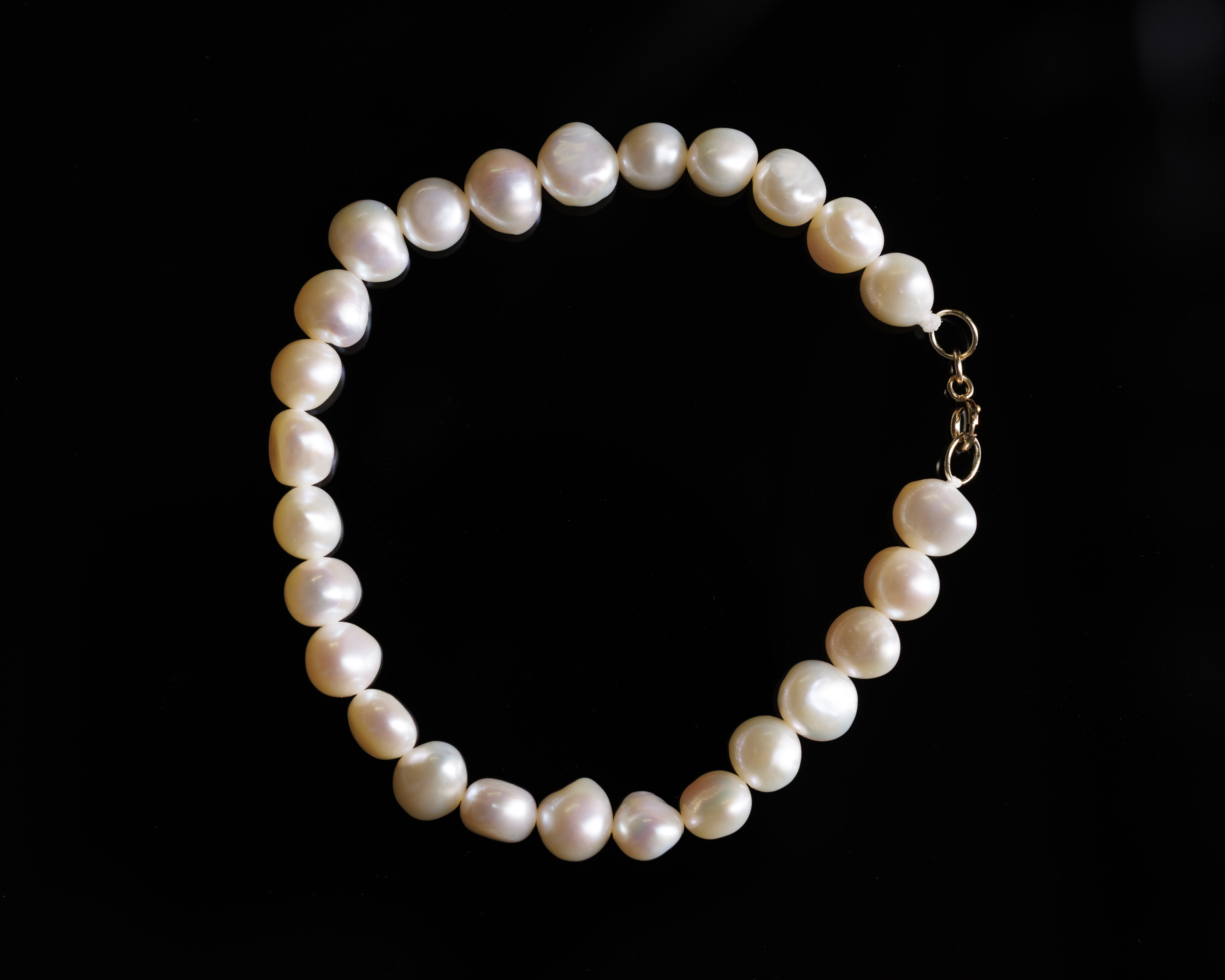 Pear bracelet product photography.