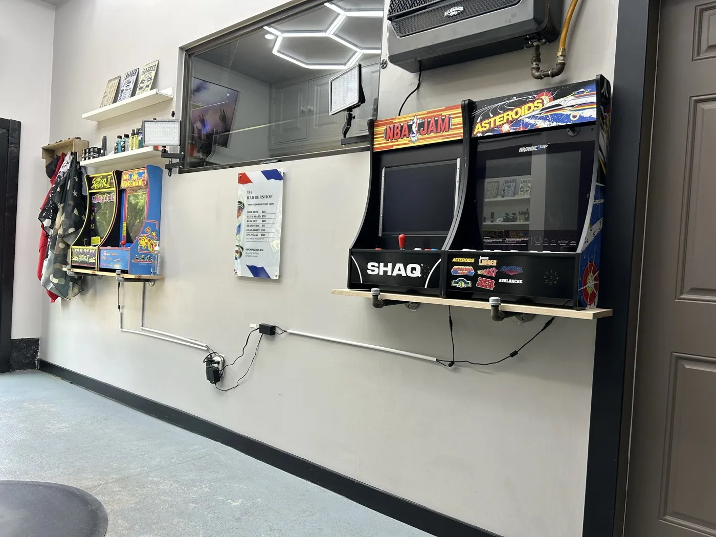 Arcade games at 519 Barbershop