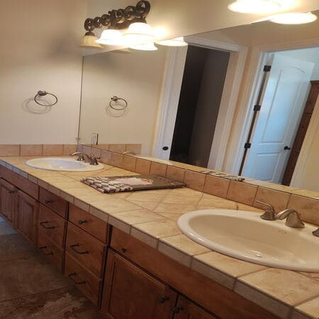 Bathroom vanity with tile counter after a cleaning