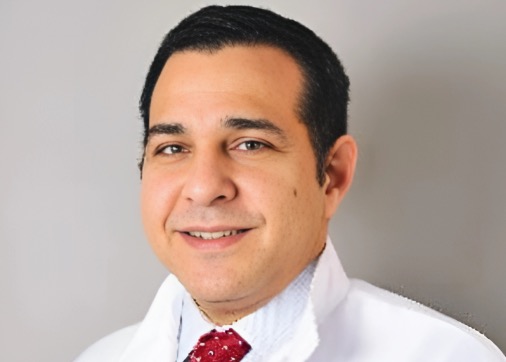 Dr. Carmy Michael, dental implant specialist at Dental Care of Rialto