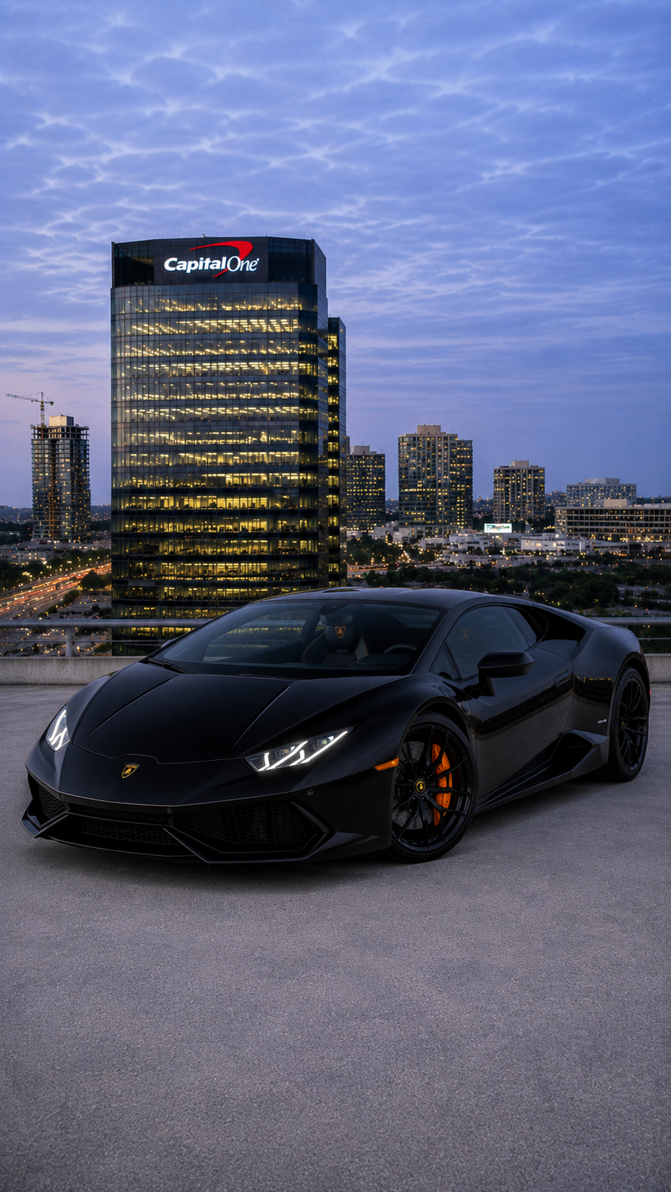 Black Lamborghini Huracan side profile slide 2