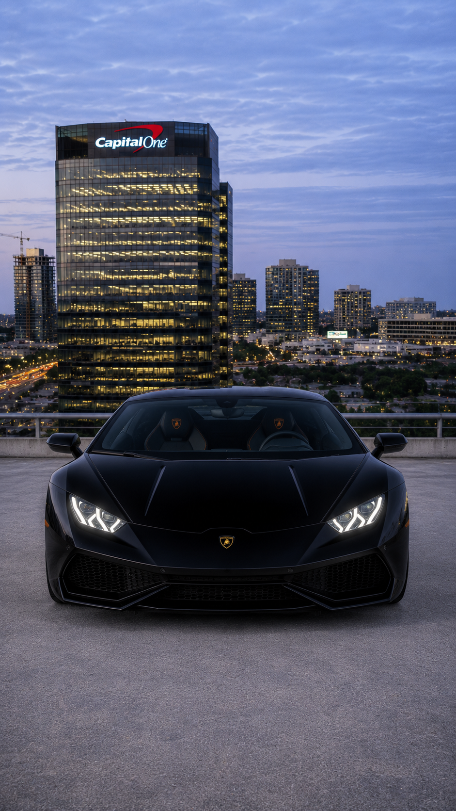 Black Lamborghini Huracan exterior front view slide 1