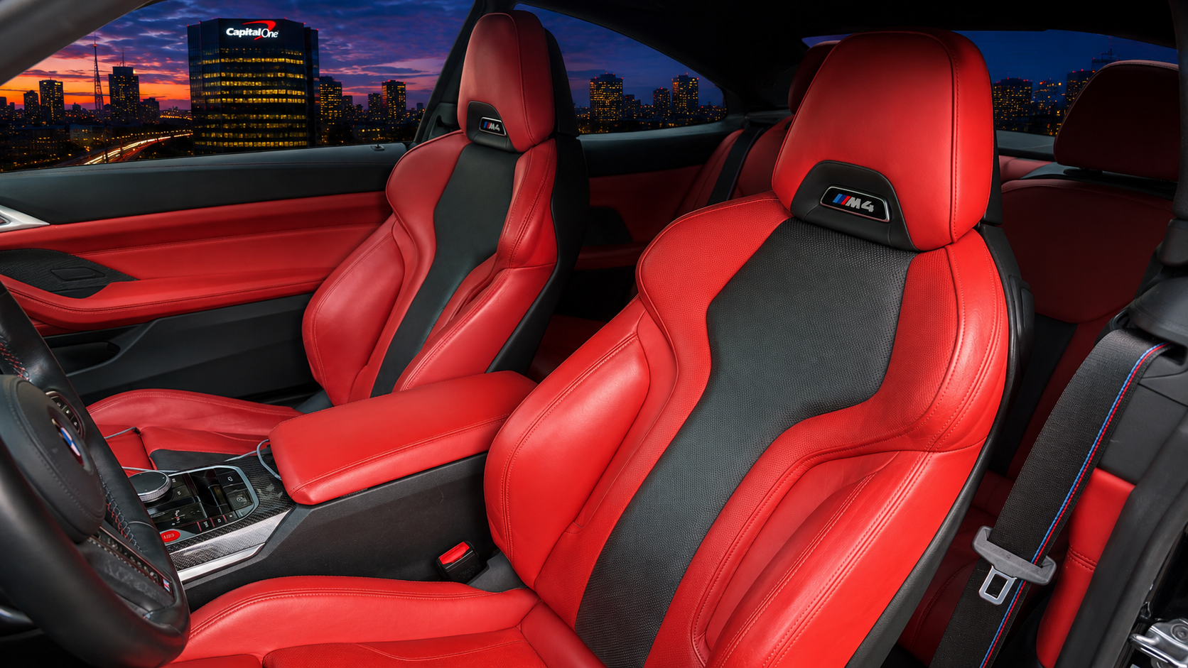 BMW M4 Competition Convertible premium interior featuring red leather seats, luxury craftsmanship, and advanced technology