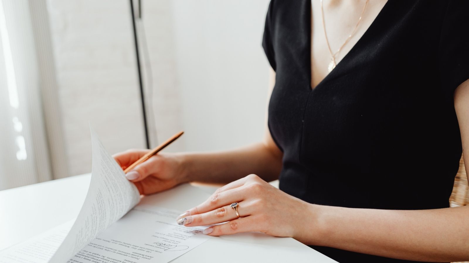 Business owner meeting with a financial adviser to discuss protection options. Business owner meeting with a financial adviser to discuss protection options.