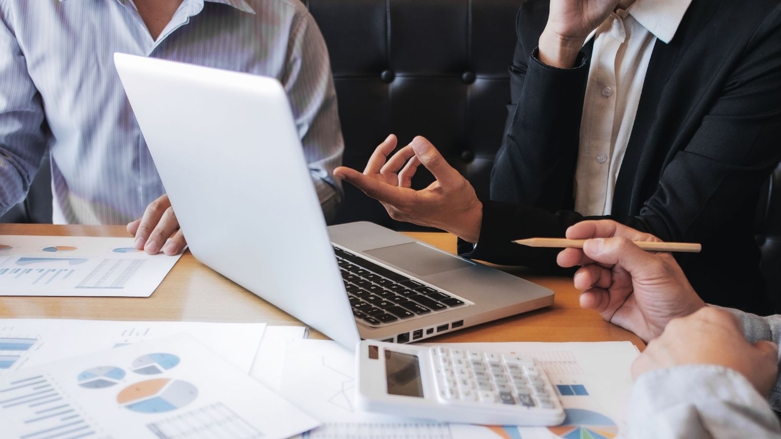 Reviewing business valuations and financial documents.