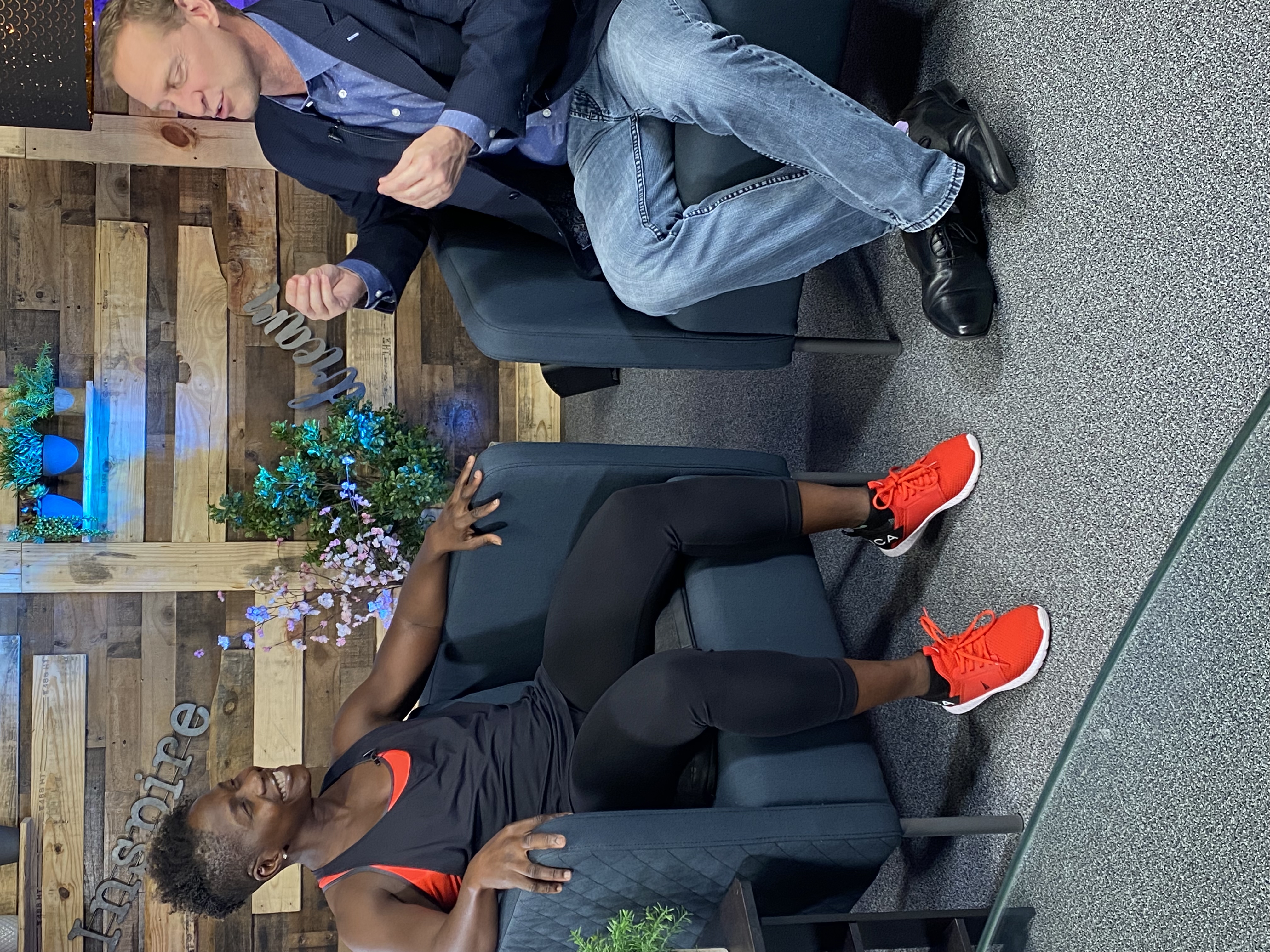 Chinyere Sam being interviewed on a TV talk show