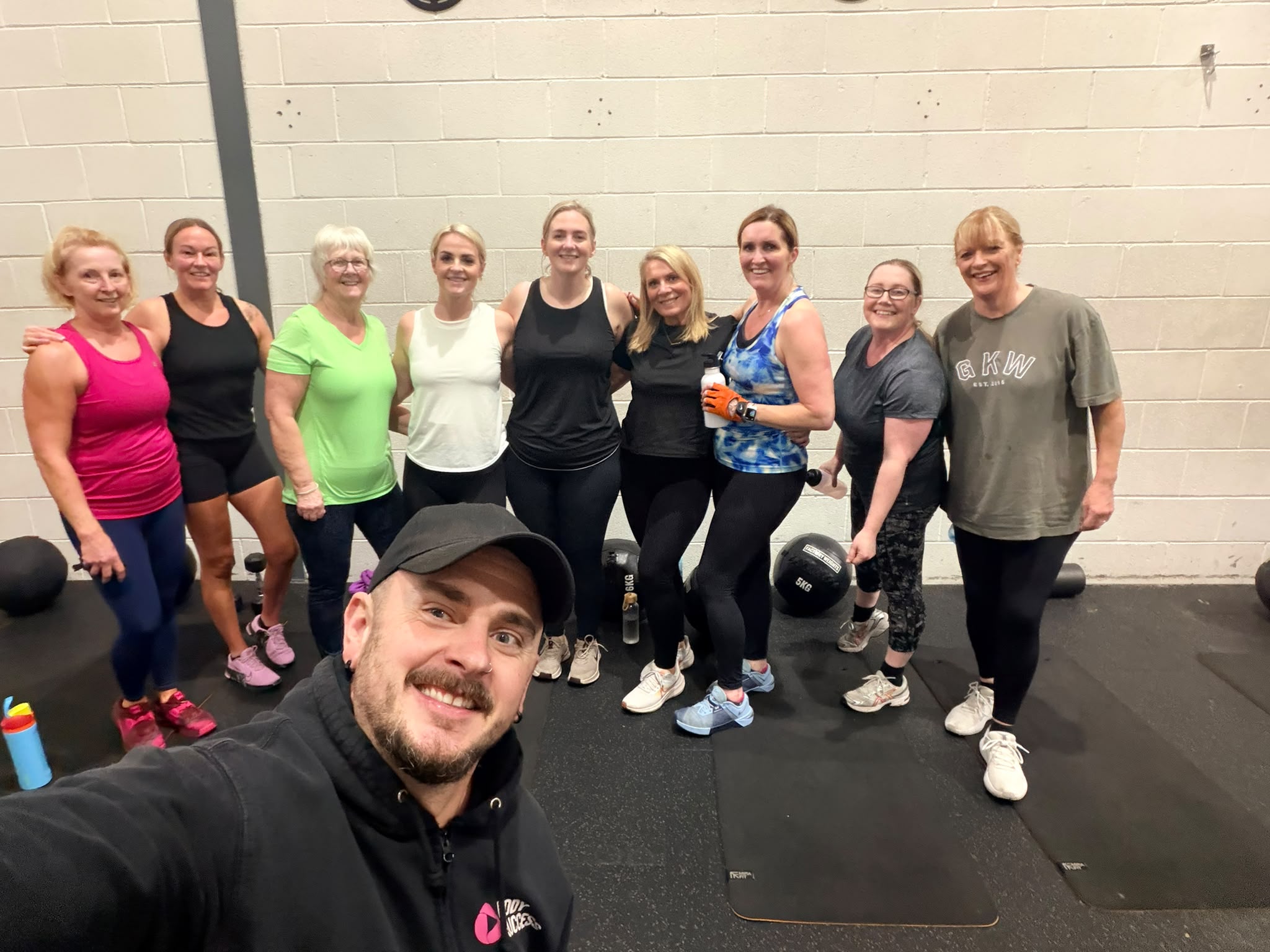 Personal trainer coaching a client