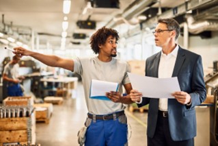 CEO walking the manufacturing floor with director level leadership CEO walking the manufacturing floor with director level leadership