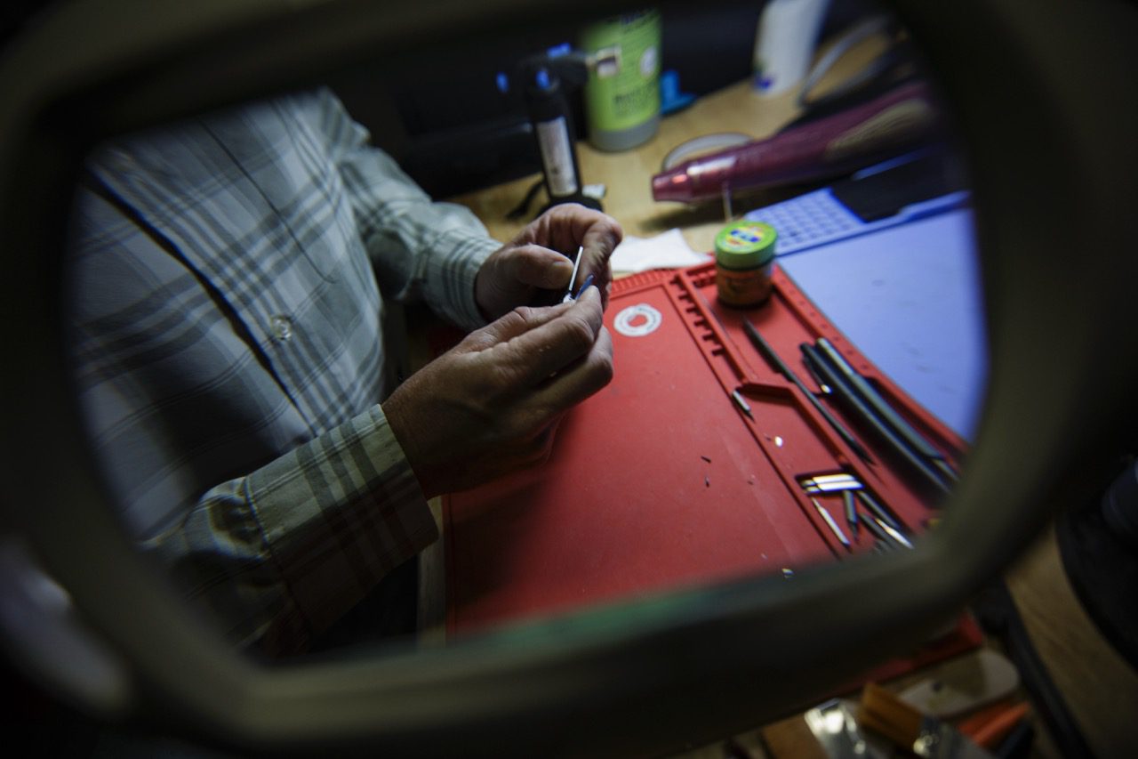 Close-up of device repair work at the Redding Smart Repair shop