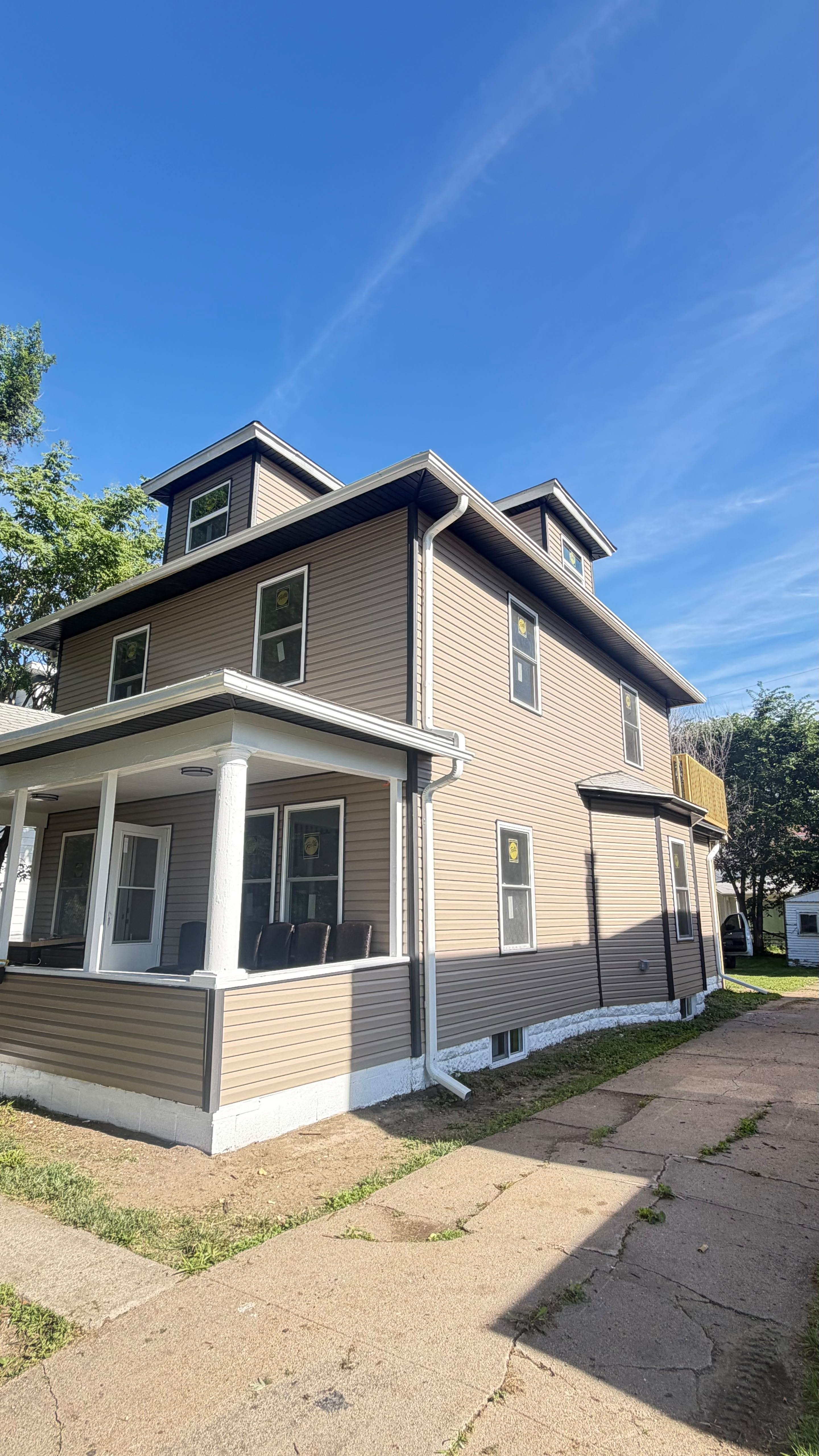 Exterior home painting project by Paiz Restoration LLC