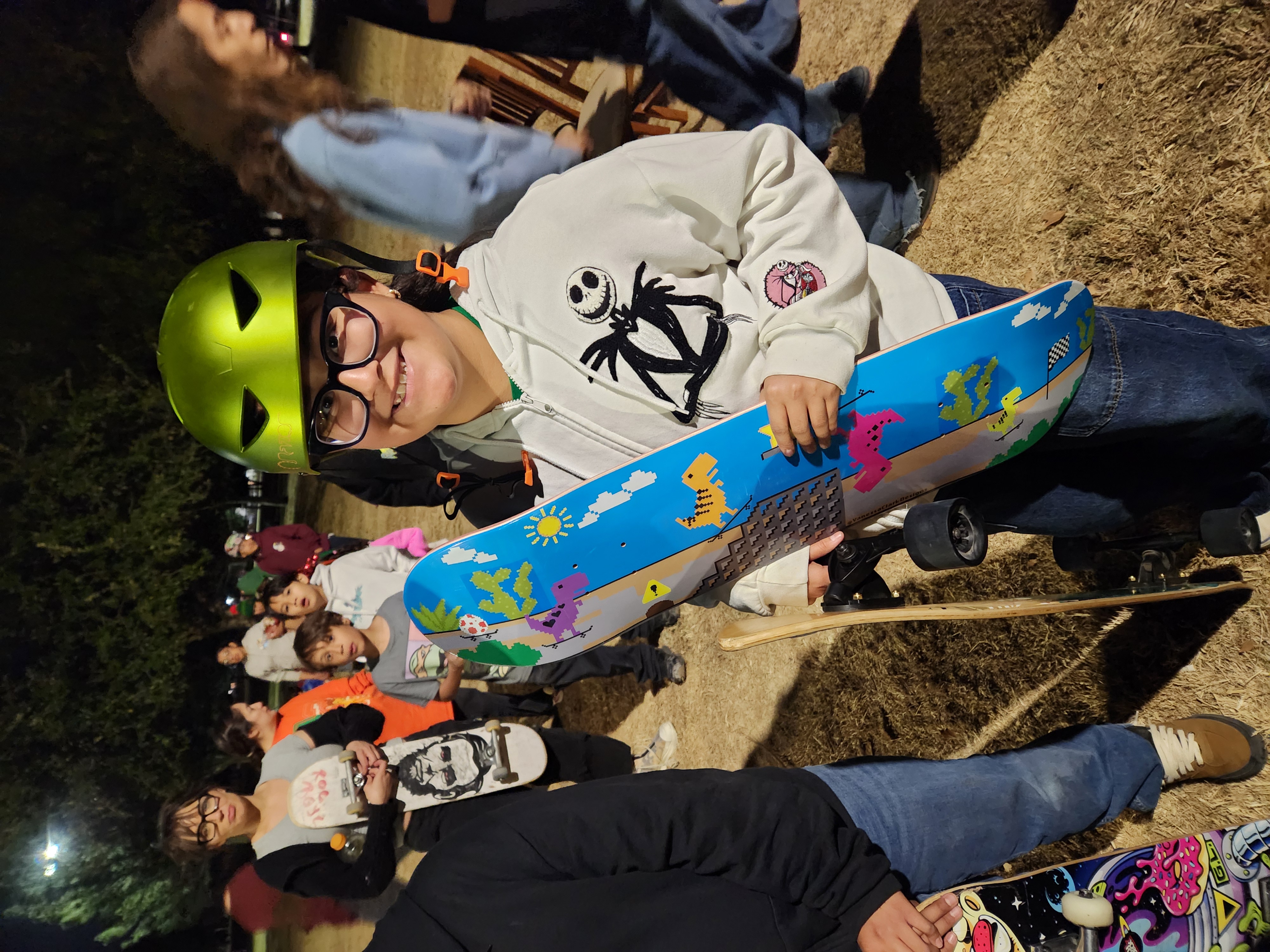 SK84KIDS youth skater showing custom board