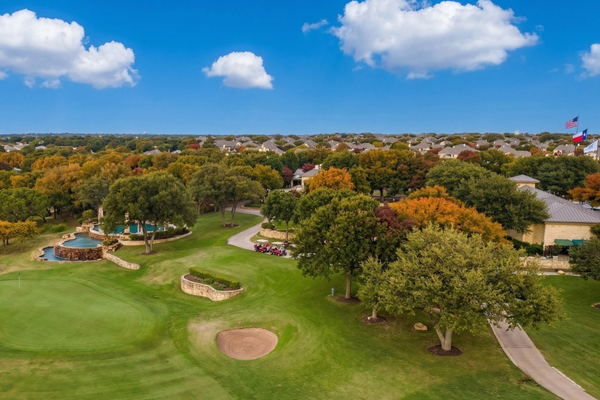 Avery Ranch Austin master planned community with newer homes, sidewalks, and suburban neighborhood design