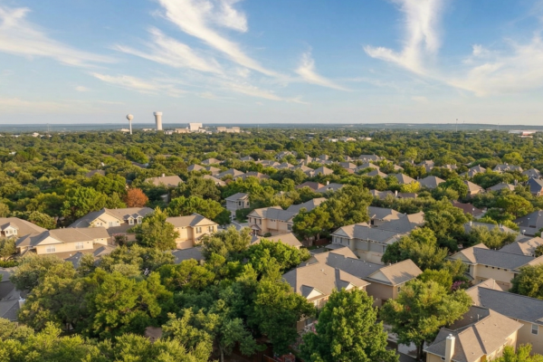 Anderson Mill Austin neighborhood with suburban homes, sidewalks, and convenient access to major roads and schools