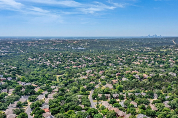 Oak Forest Austin neighborhood with mature trees, established homes, and proximity to Westwood High School