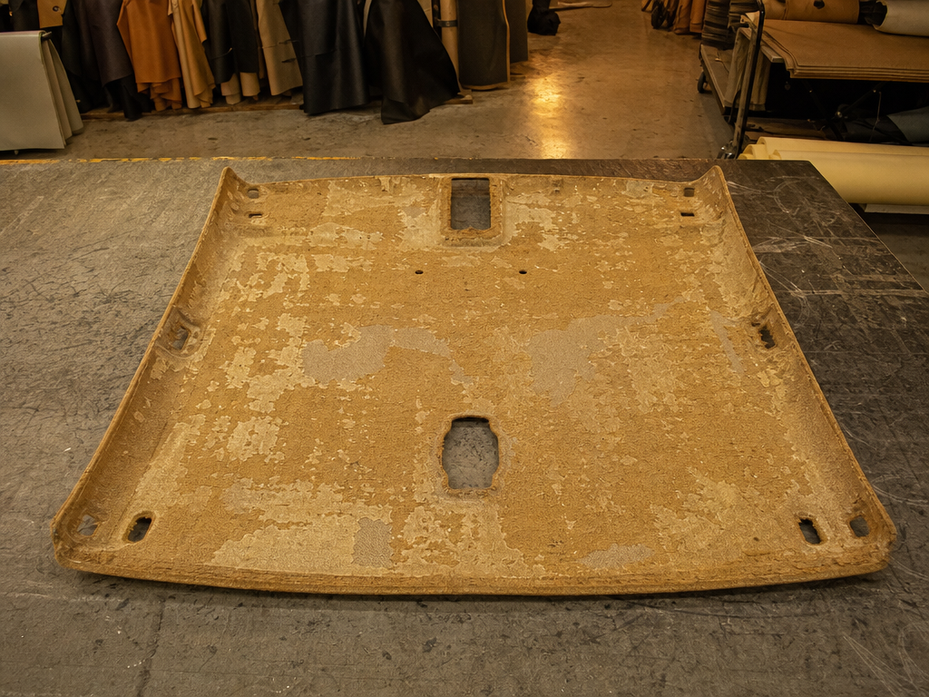 Sagging car headliner before repair — My Upholstery Guys Fort Worth