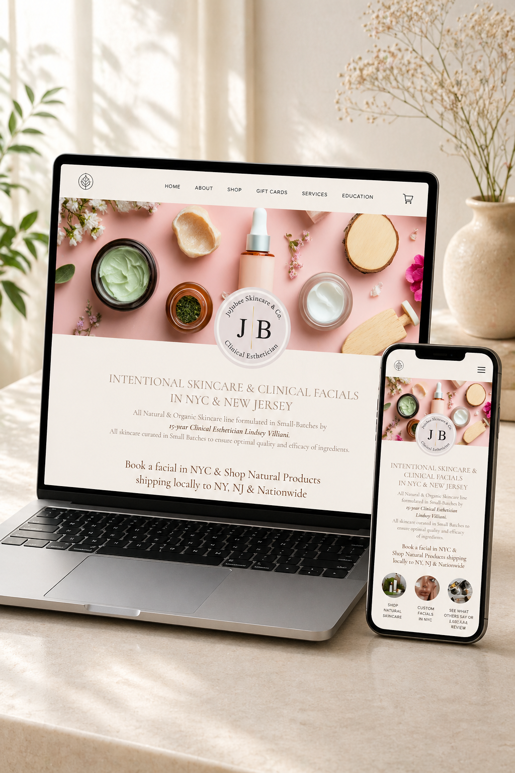 Professional website design workspace showing mockups wireframes and digital strategy documents for a local business website