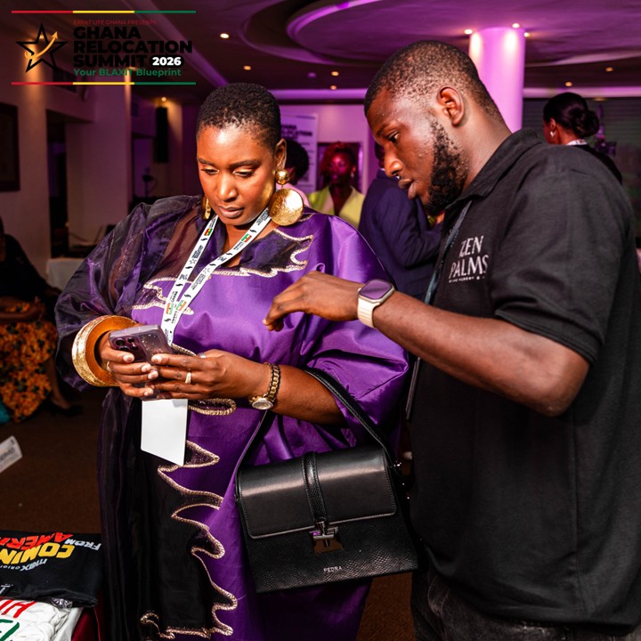 Summit attendees exchanging contacts and building community