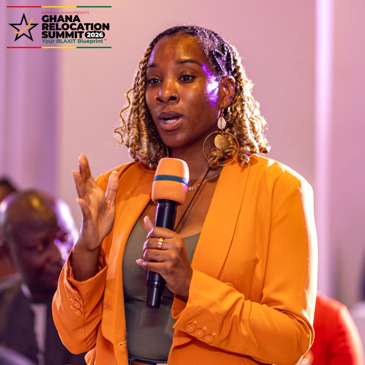 Attendee asking questions at the Ghana Relocation Summit