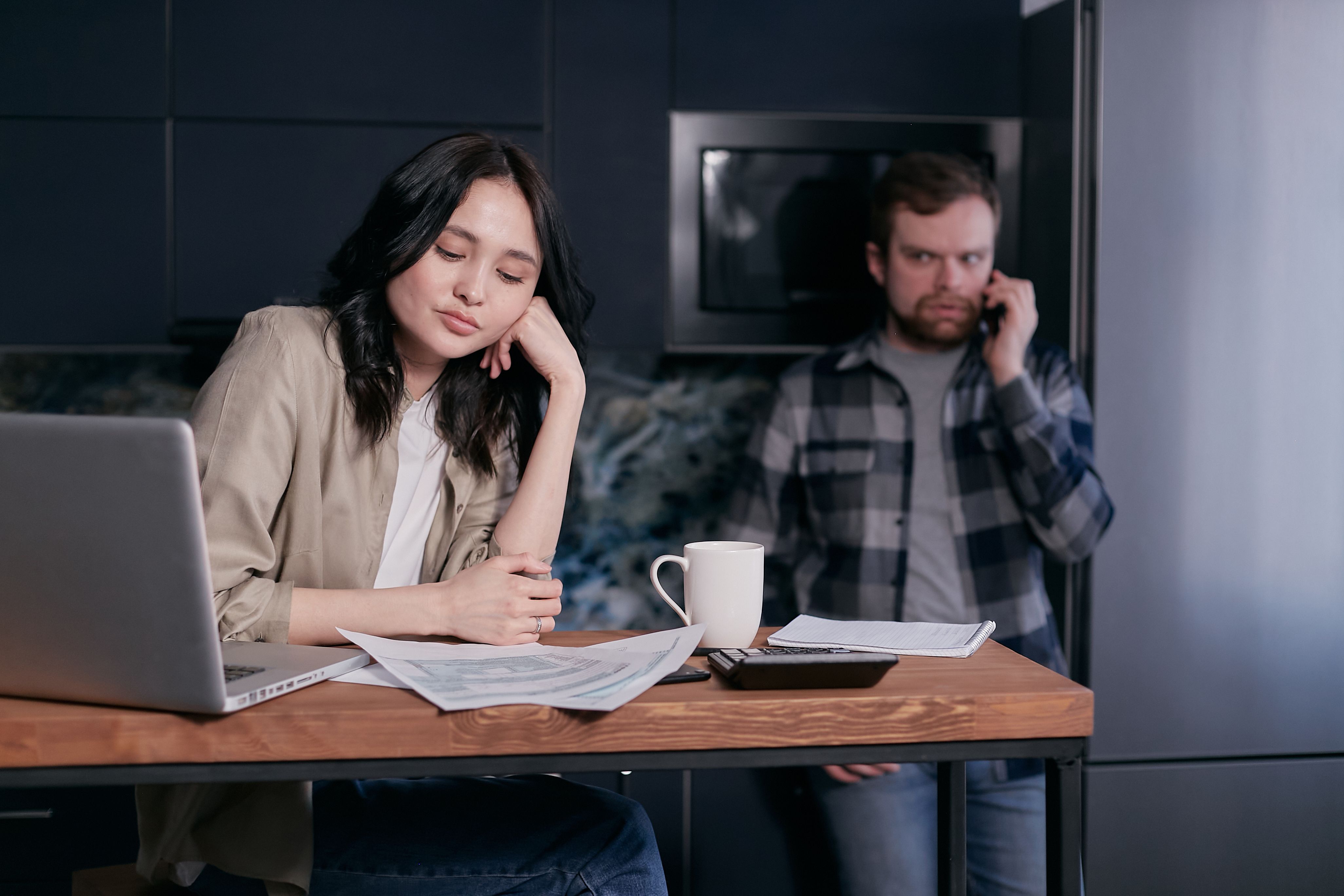 homeowners reviewing financial documents