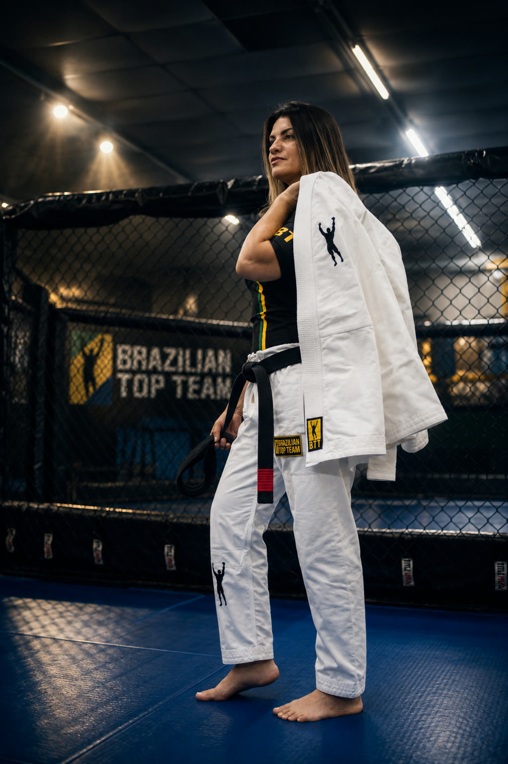 Denise Gamonal with her black belt at Brazilian Top Team