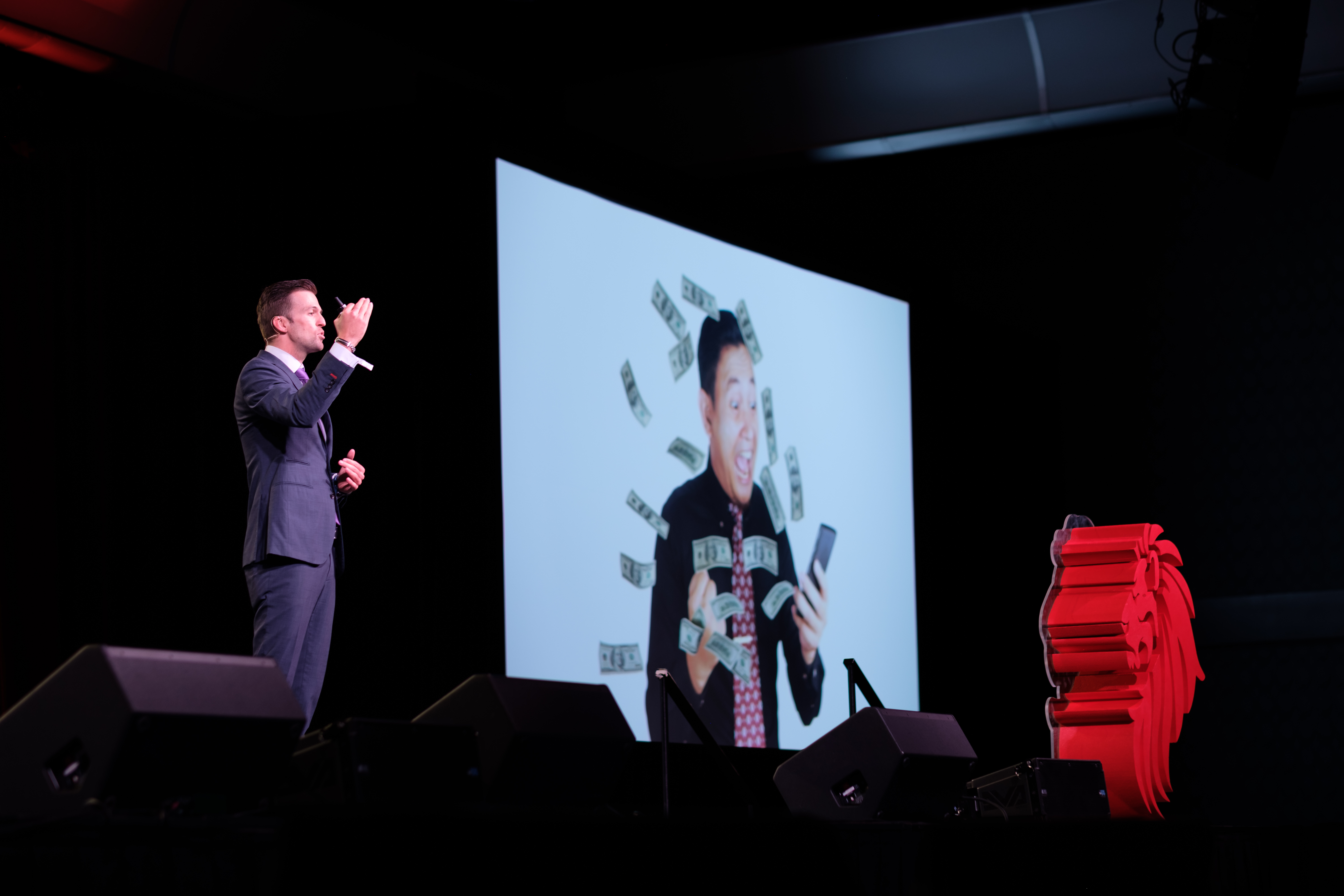 Matt Clark speaking on stage