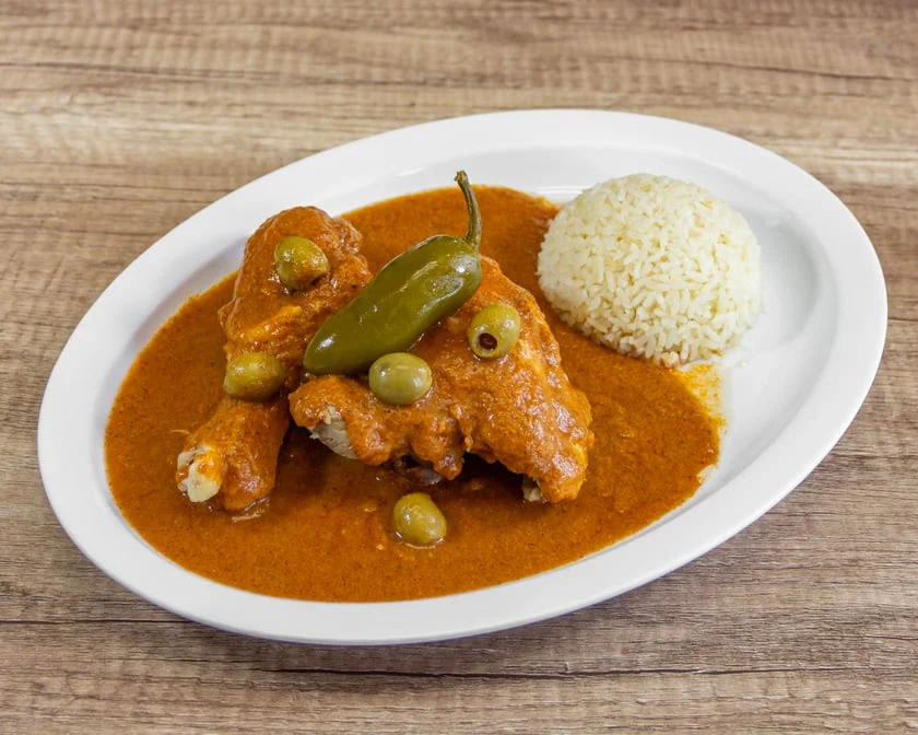 Tlayuda Oaxaqueña — crispy tortilla with black beans and Oaxaca cheese