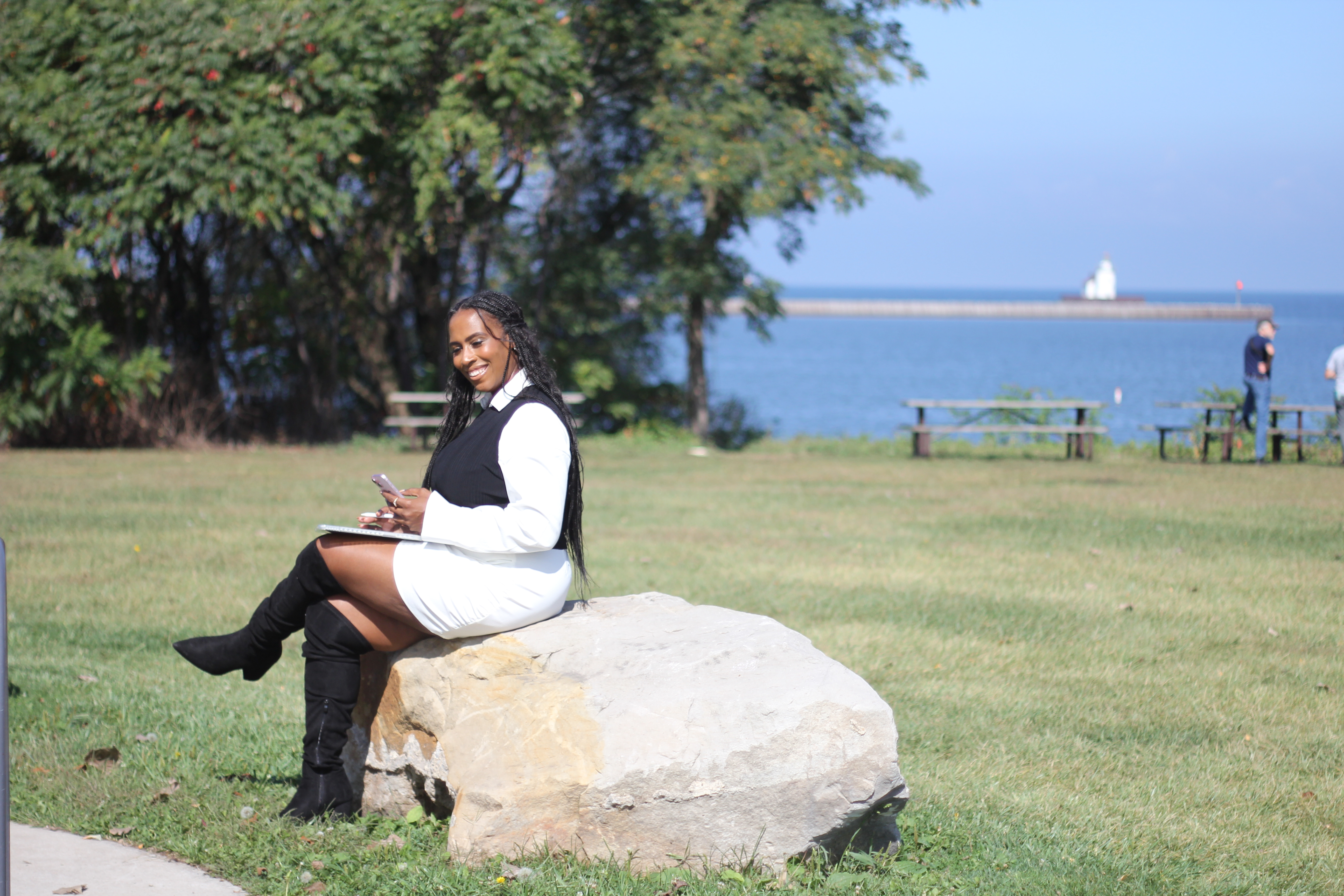 Camille Janei Swoope sitting by the water