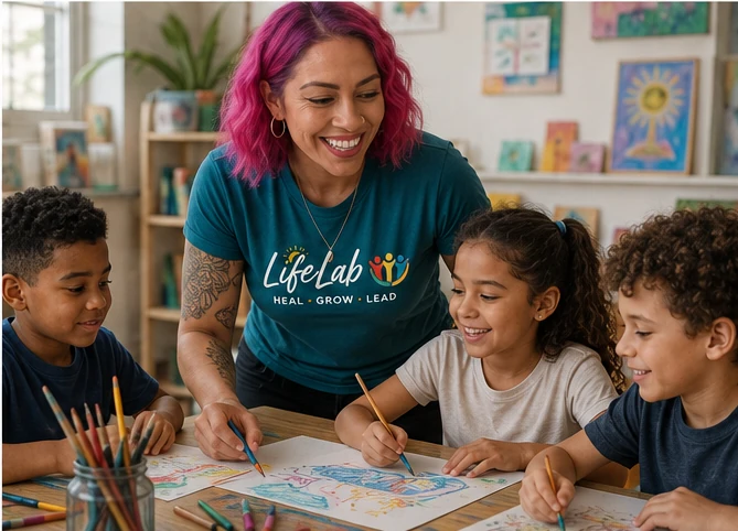 Kamene leading an art therapy session with kids