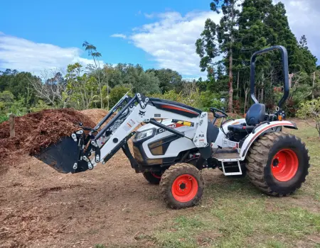 Grass and Gravel Tractor doing earthworks