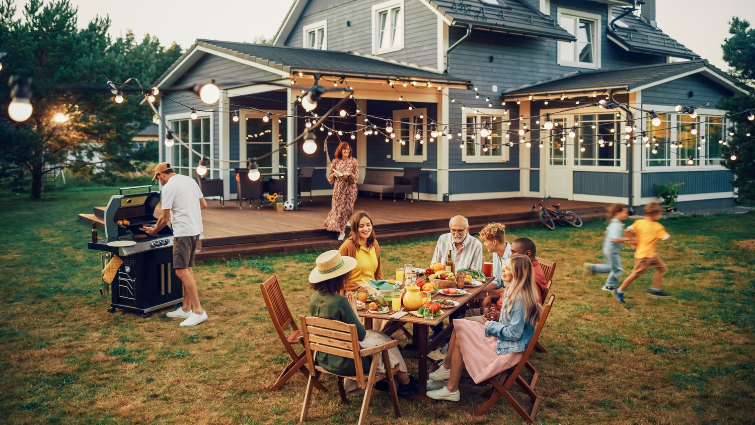 A family enjoying a backyard gathering at home