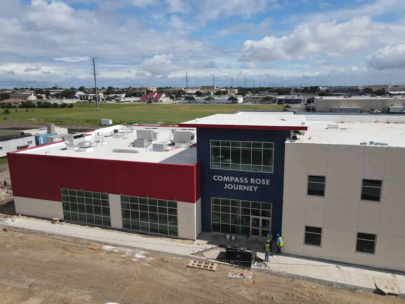 Construction site aerial monitoring commercial groundbreaking site overview