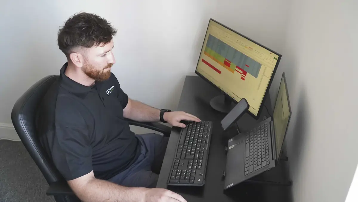 Joe analysing property investment numbers